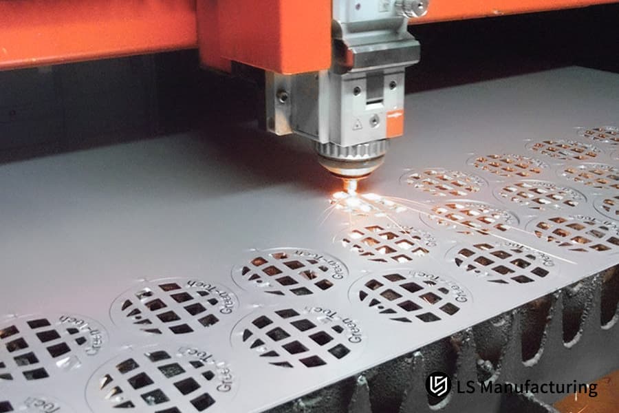 Etching circular Green Tech patterns into stainless steel for water filtration or environmental system meshes.