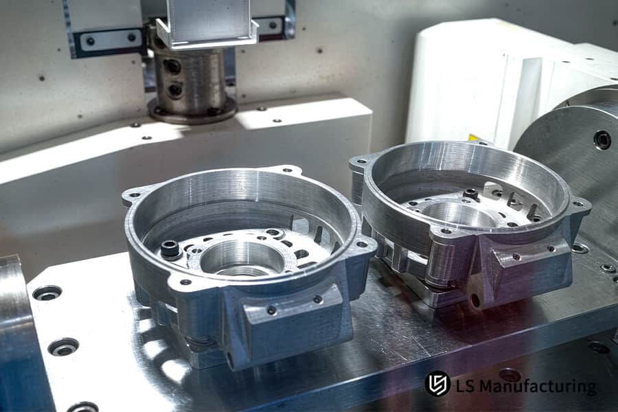 CNC lathe finishes aluminum automotive wheel hub to 0.03 mm concentricity.