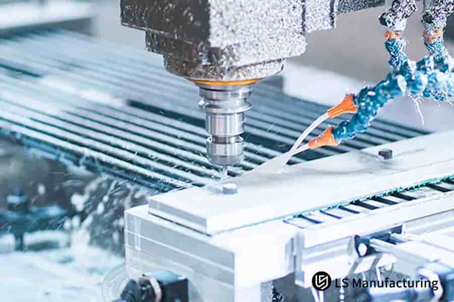 CNC machining with coolant stream and metal chips by LS Manufacturing.jpg