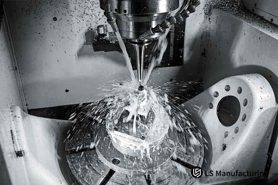 Custom CNC milling service cuts metal cavity with high pressure coolant.