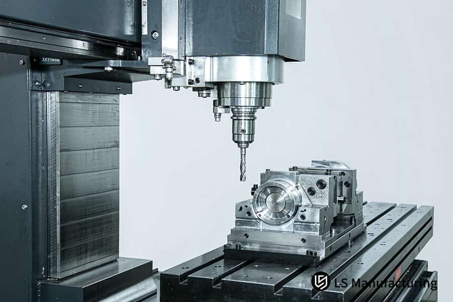 Tool mills square block explaining why multi-axis parts fail inspection due to positional drift of ±0.015 mm without certification.