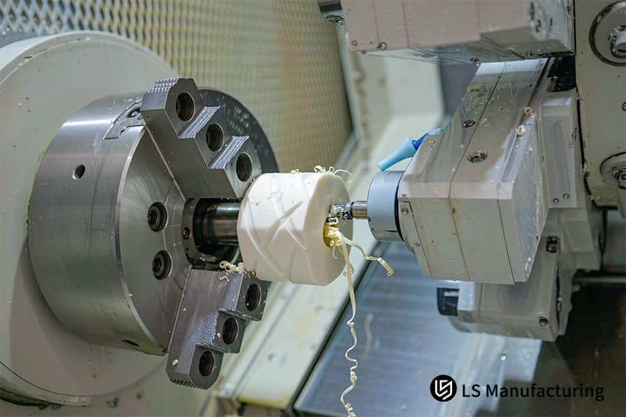 CNC machining holds white cylinder flatness within 30 microns.