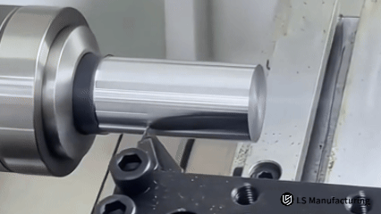 High-precision CNC lathe cutting metal workpiece close-up by LS Manufacturing