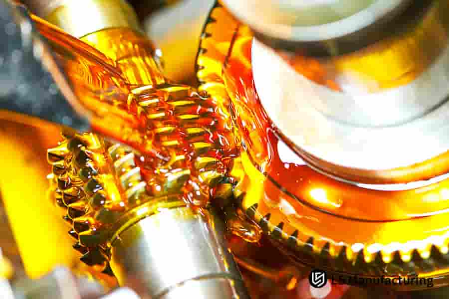 Industrial gear cutting lubrication process closeup by LS Manufacturing