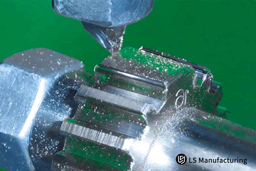 Industrial gear machining with metal chips flying closeup by LS Manufacturing.jpg