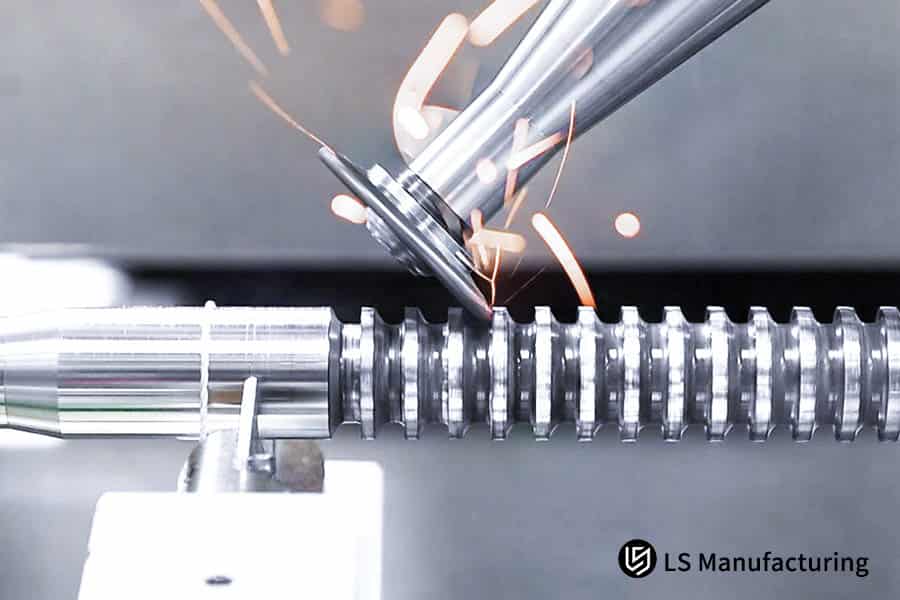 Industrial lathe producing metallic sparks during precision cutting by LS Manufacturing.jpg