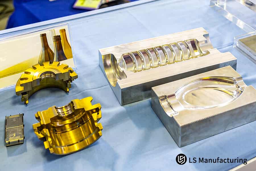 The precision aluminum and steel mold components enable flash and void free injection molding in production.