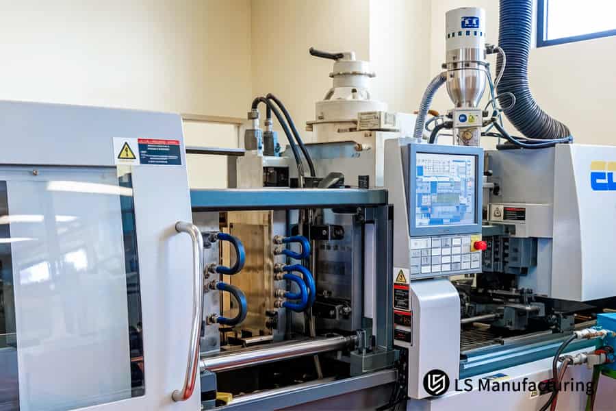 A large industrial press monitors parameters to create defect-free aerospace parts from exotic resin.
