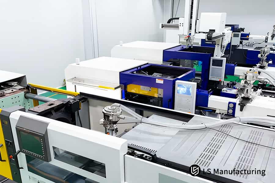 Robotic arms transfer precision molded medical parts with 0.02mm tolerances for quality inspection.