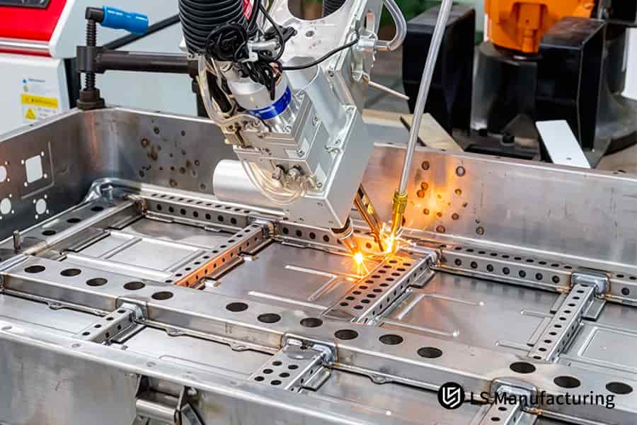 Cutting 304 stainless steel plates for EV battery thermal interface components with a powerful laser.