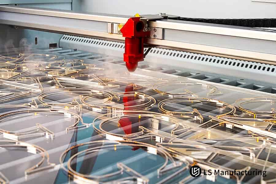 Laser cutting forms precise gear teeth on extruded acrylic for industrial automation parts.