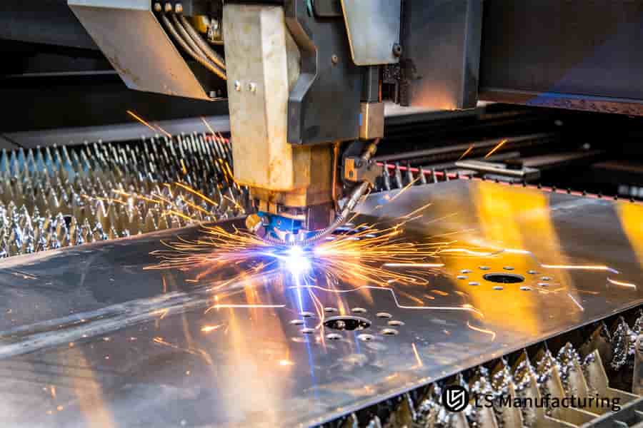 A laser provides precision laser cutting services for thin aluminum electronics enclosure panels.