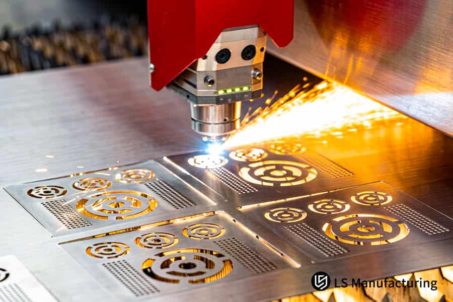 A high precision laser cuts 316L stainless steel sheet for food grade conveyor belt components.