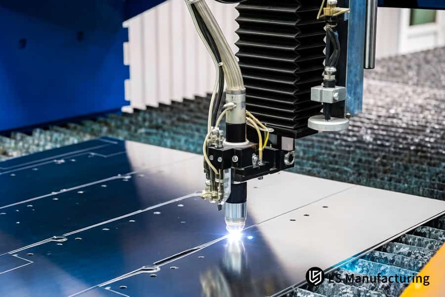 A CNC laser machines an aluminum plate for industrial machinery frames with 6061-T6 aluminum laser cutting.