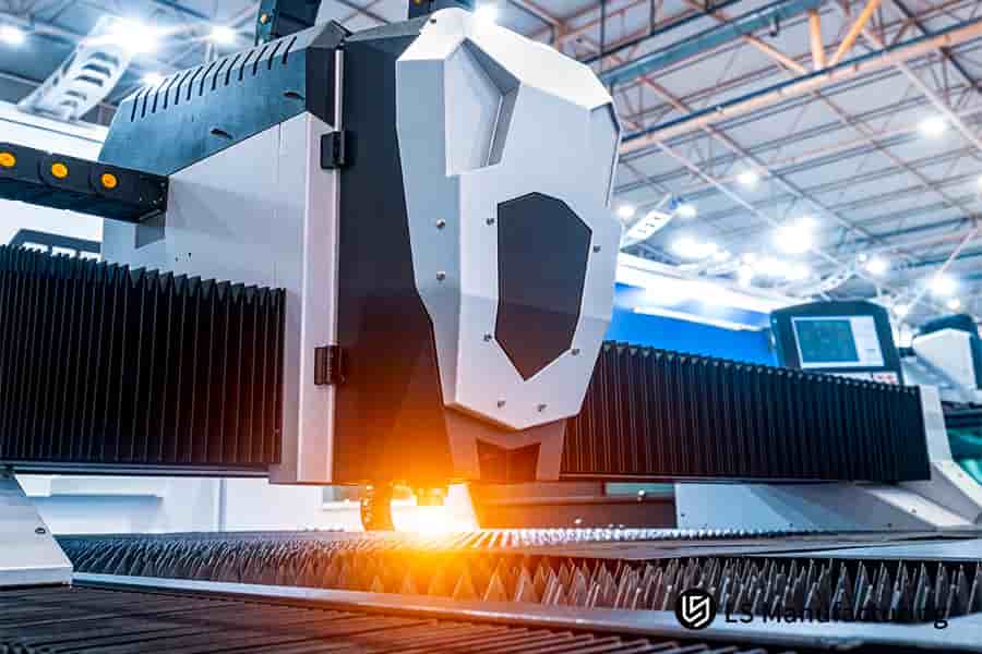 Slicing a carbon steel bracket with high tolerance laser cutting for industrial machinery assembly.