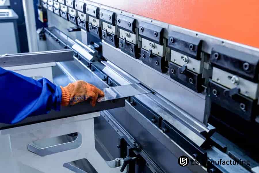 DP980 part with measurement tools on a bench