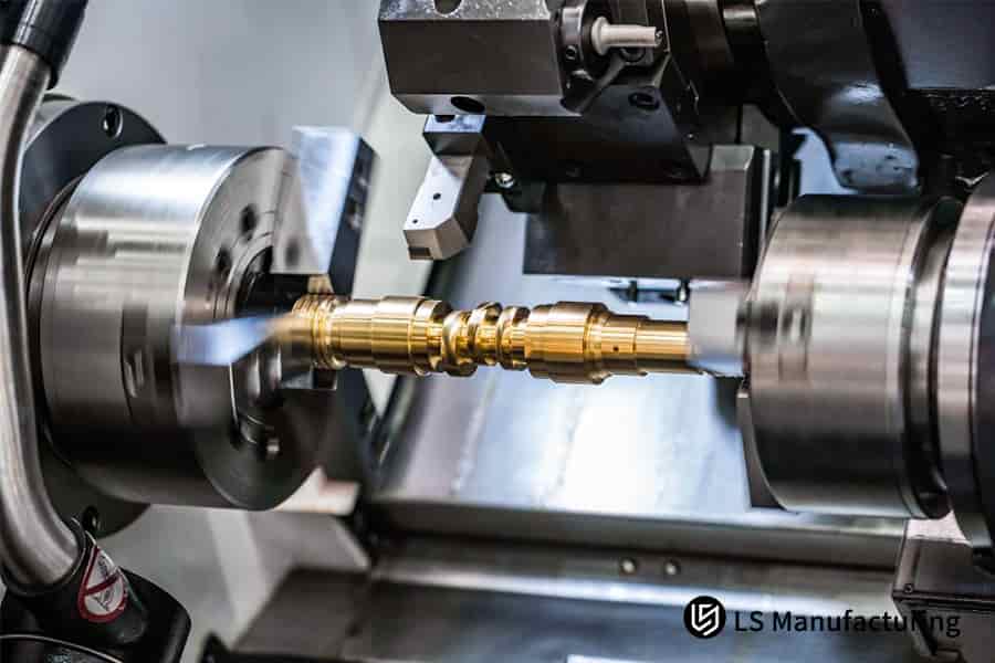 Precise shaping of a rotating brass component on lathe by LS Manufacturing.jpg