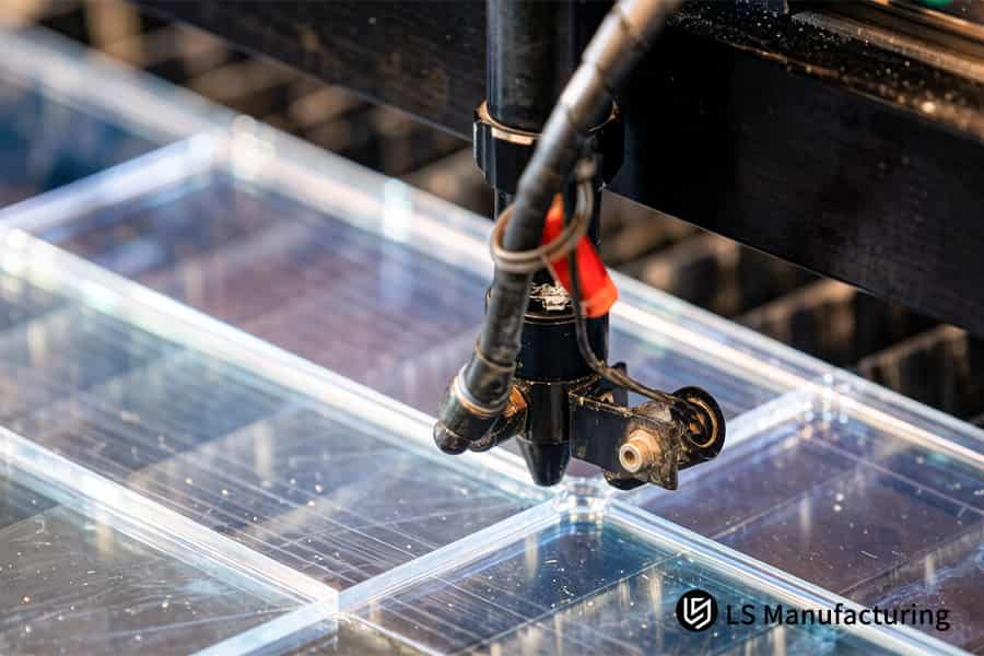 Precision machining mills flat surfaces on cast acrylic container bottoms for tight sealing fit.