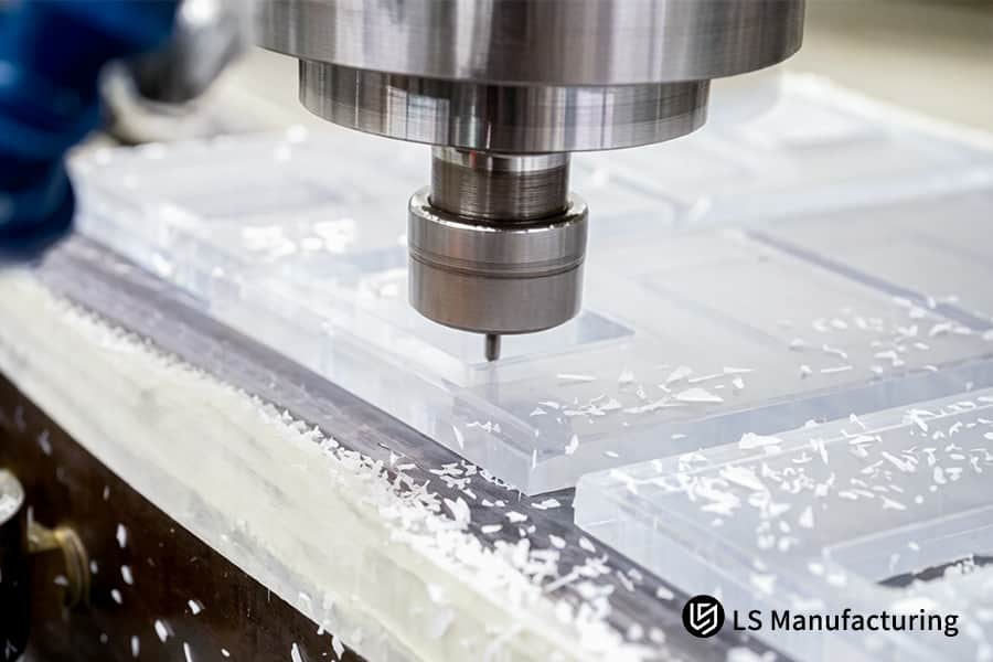 Precision machining cuts intricate slots into extruded acrylic fixture prototypes for component alignment.