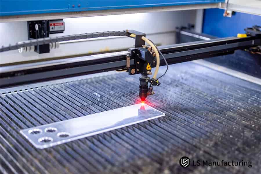 Precision machining drills precise holes into clear extruded acrylic panels for industrial assembly.