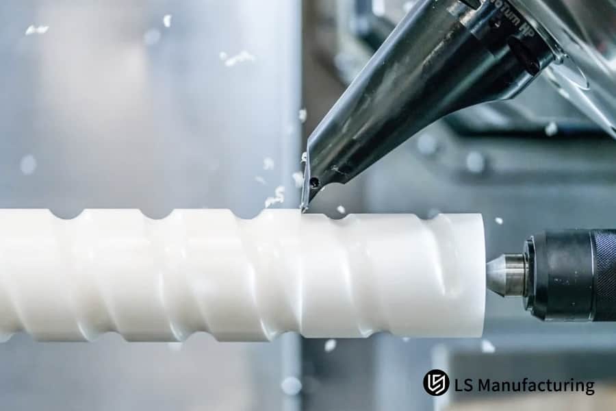 Precision milling tool cutting white cylindrical industrial workpiece by LS Manufacturing.jpg