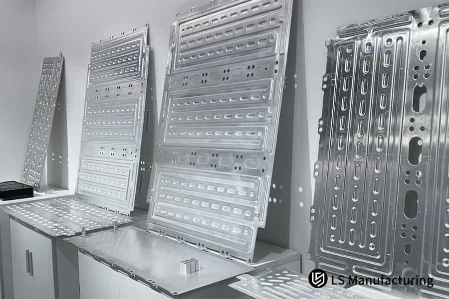 Custom metal stamping for EV cooling plates