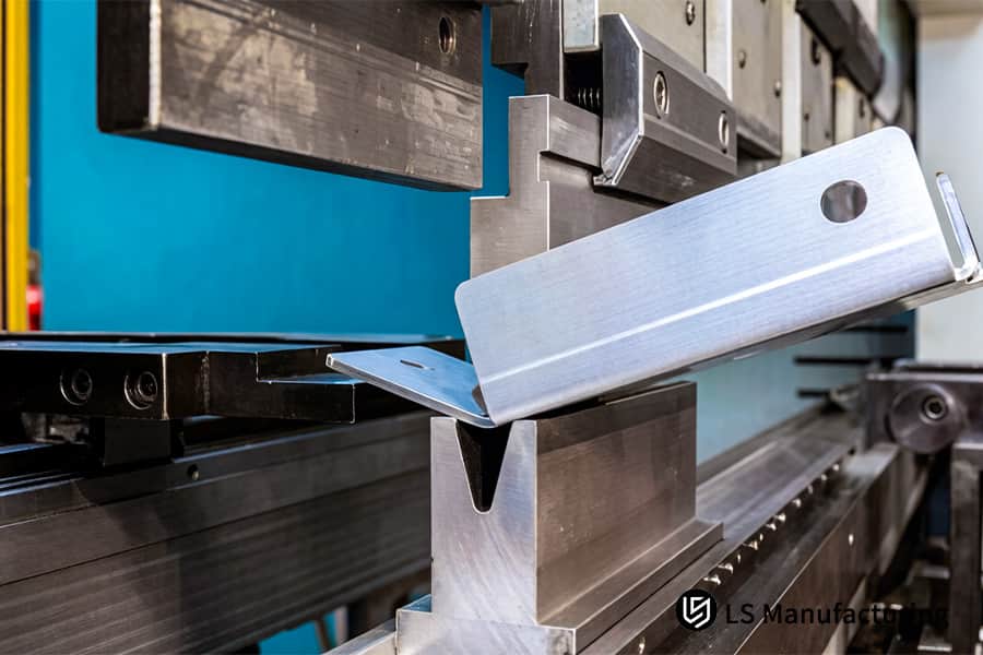 Bending a medical-grade aluminum sheet on a press brake is a precision sheet metal for medical​ device fabrication.